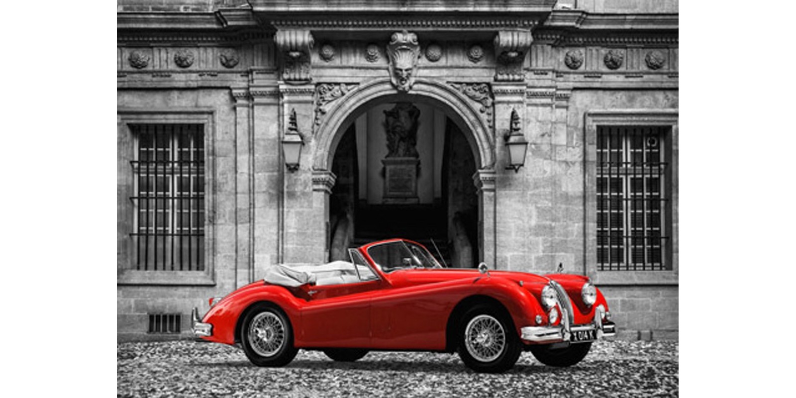 Gasoline Images - Luxury Car in front of Classic Palace